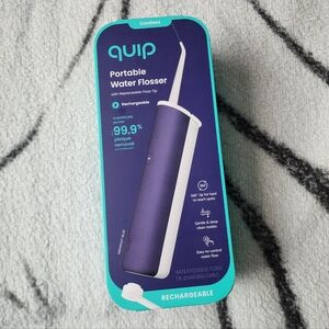 New Quip Portable Water Flosser